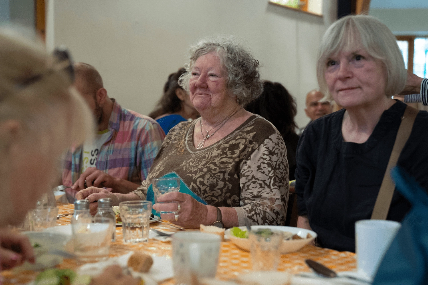 Guests eating at Community Meal