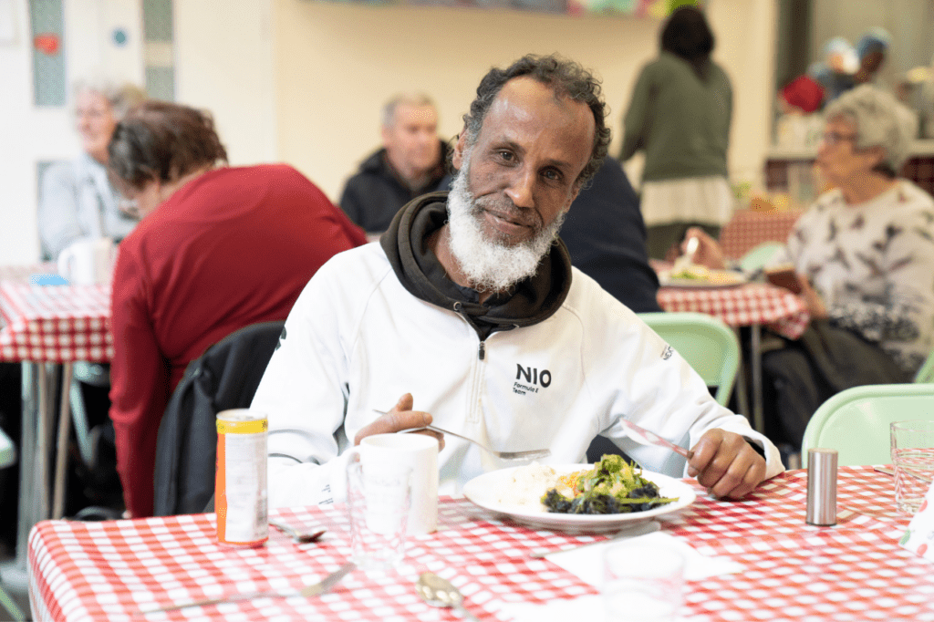 Man smiling with food